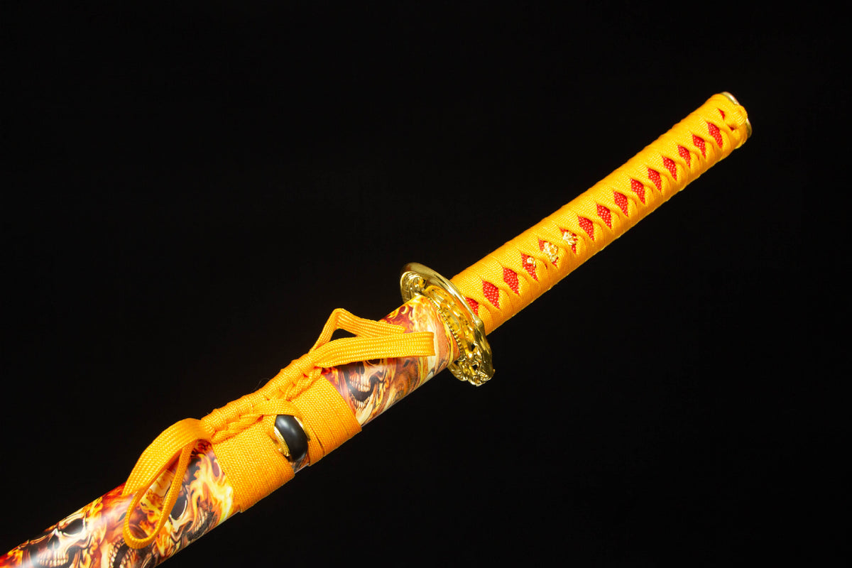 The Twin Rivers Katana with the warm patterned mounting and fittings