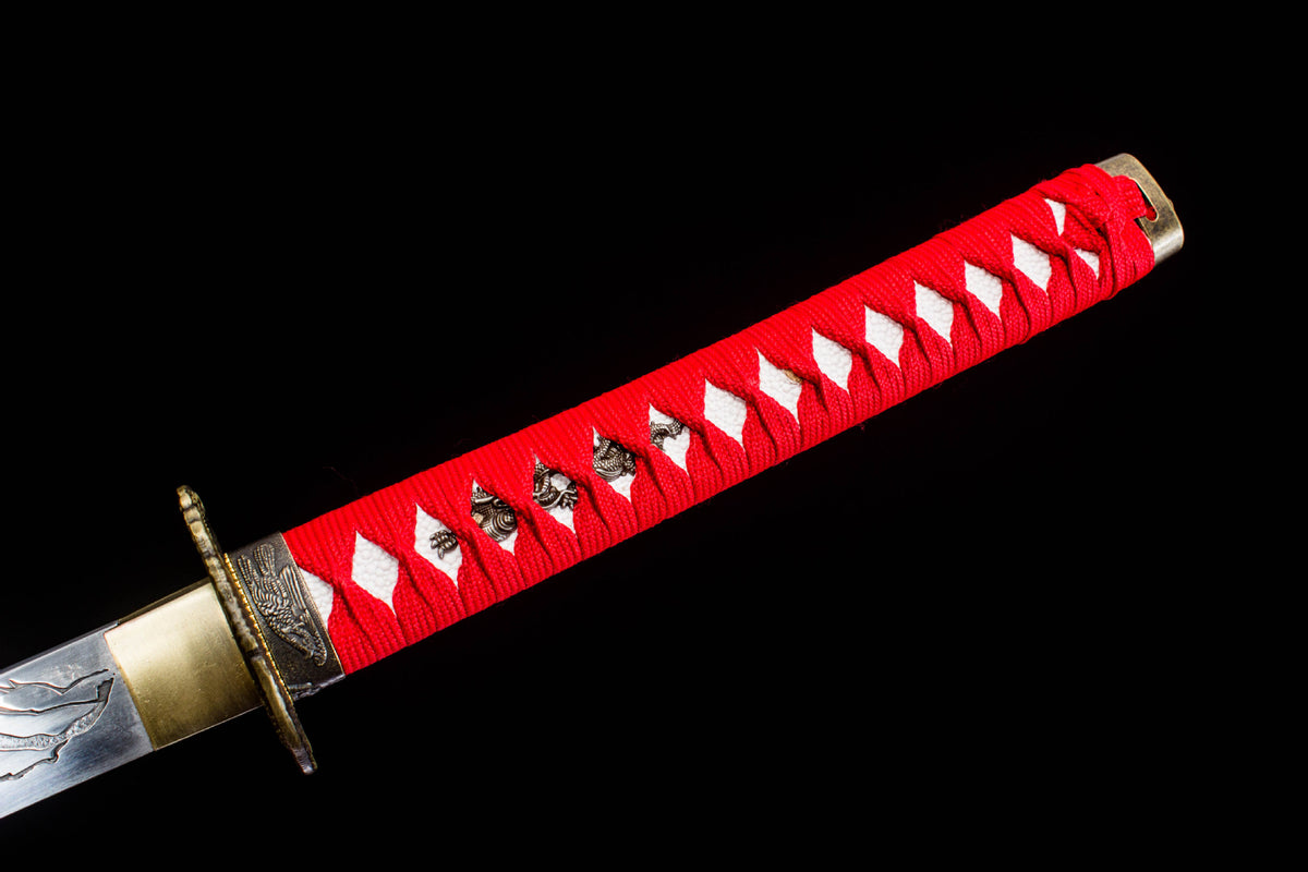 Detail view of the Crimson Crackle Katana, showing the polished blade and red handle wrap