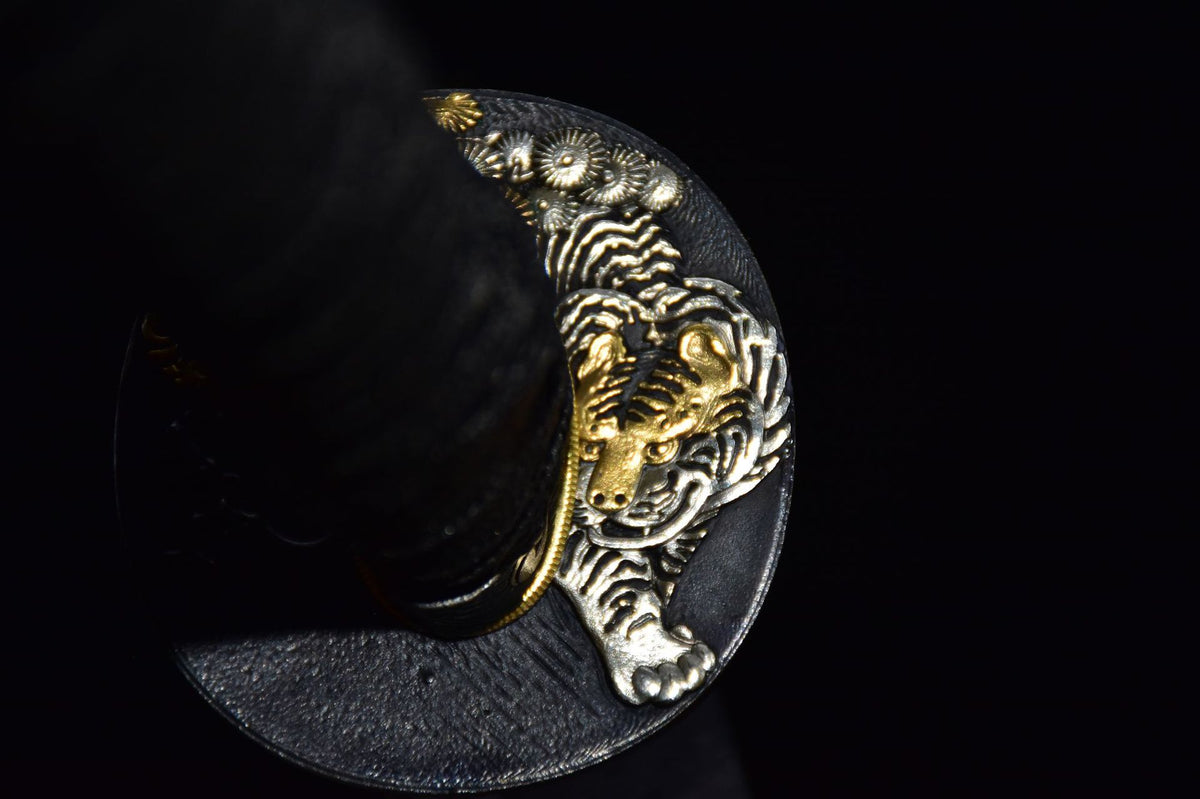 Gold and silver tiger motif katana tsuba