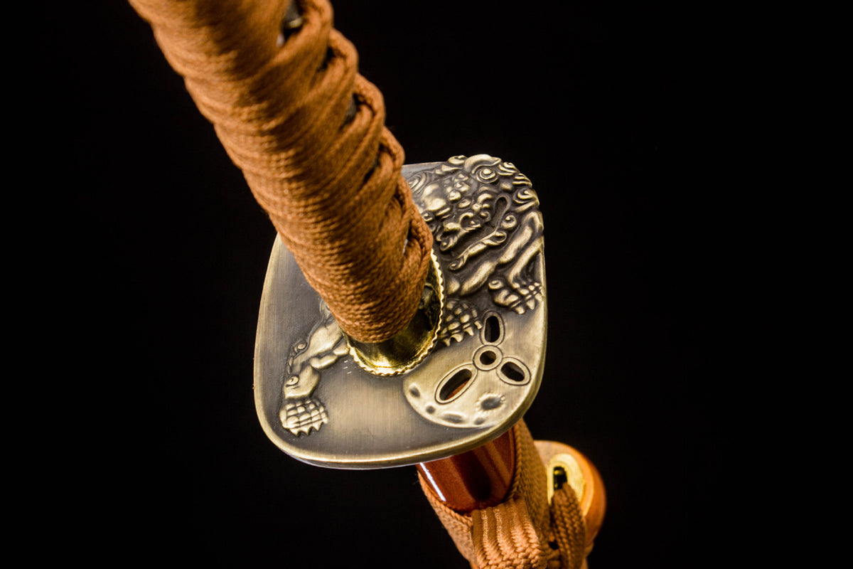 The Sakura in Gold Katana with the warm-toned fittings and blade collar