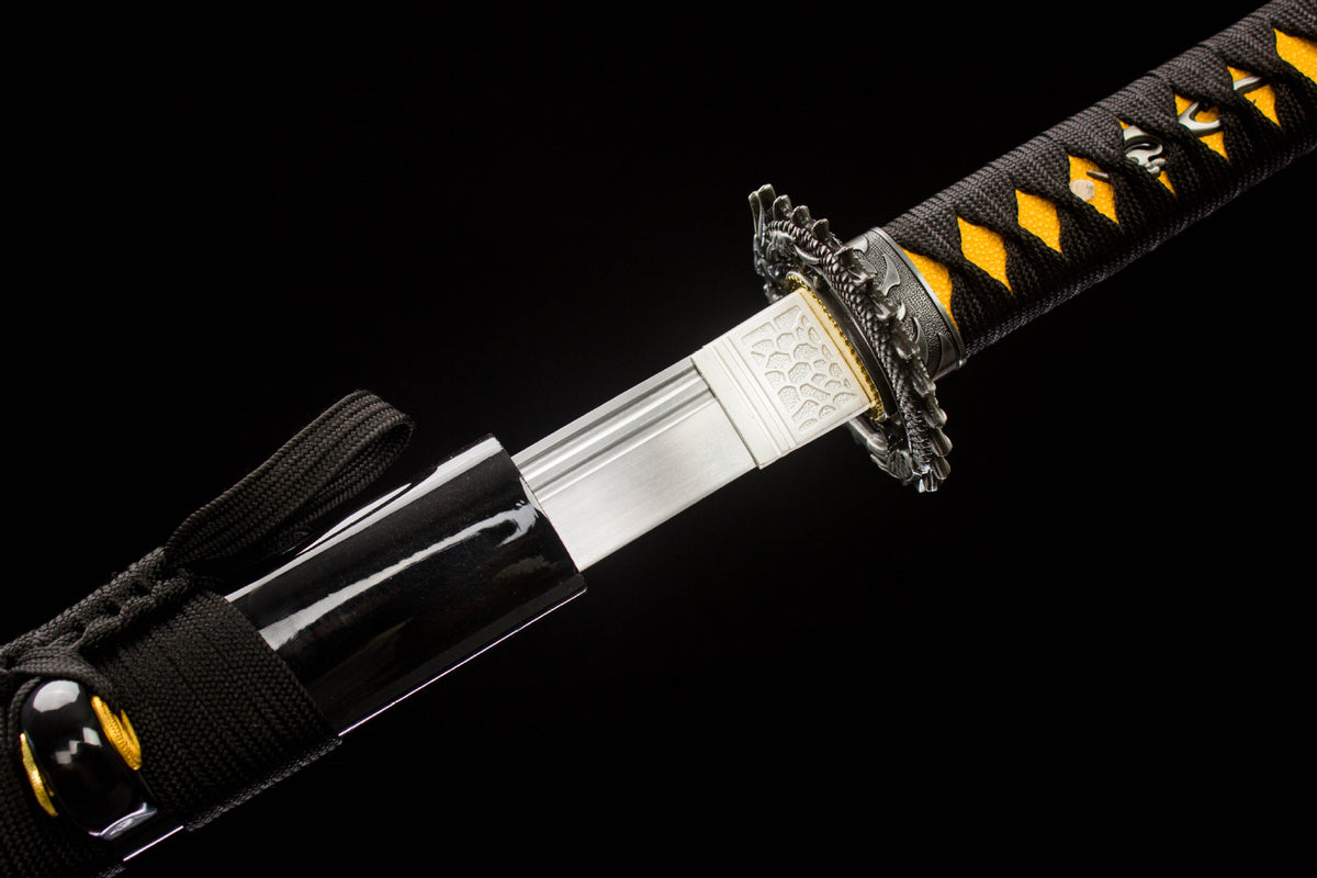Close-up detail of the Night Coil Katana, including the dark handle wrap and end fitting