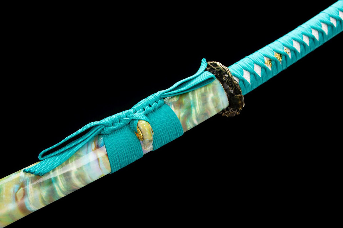 The Turquoise Pearl Katana, showing the engraved blade details