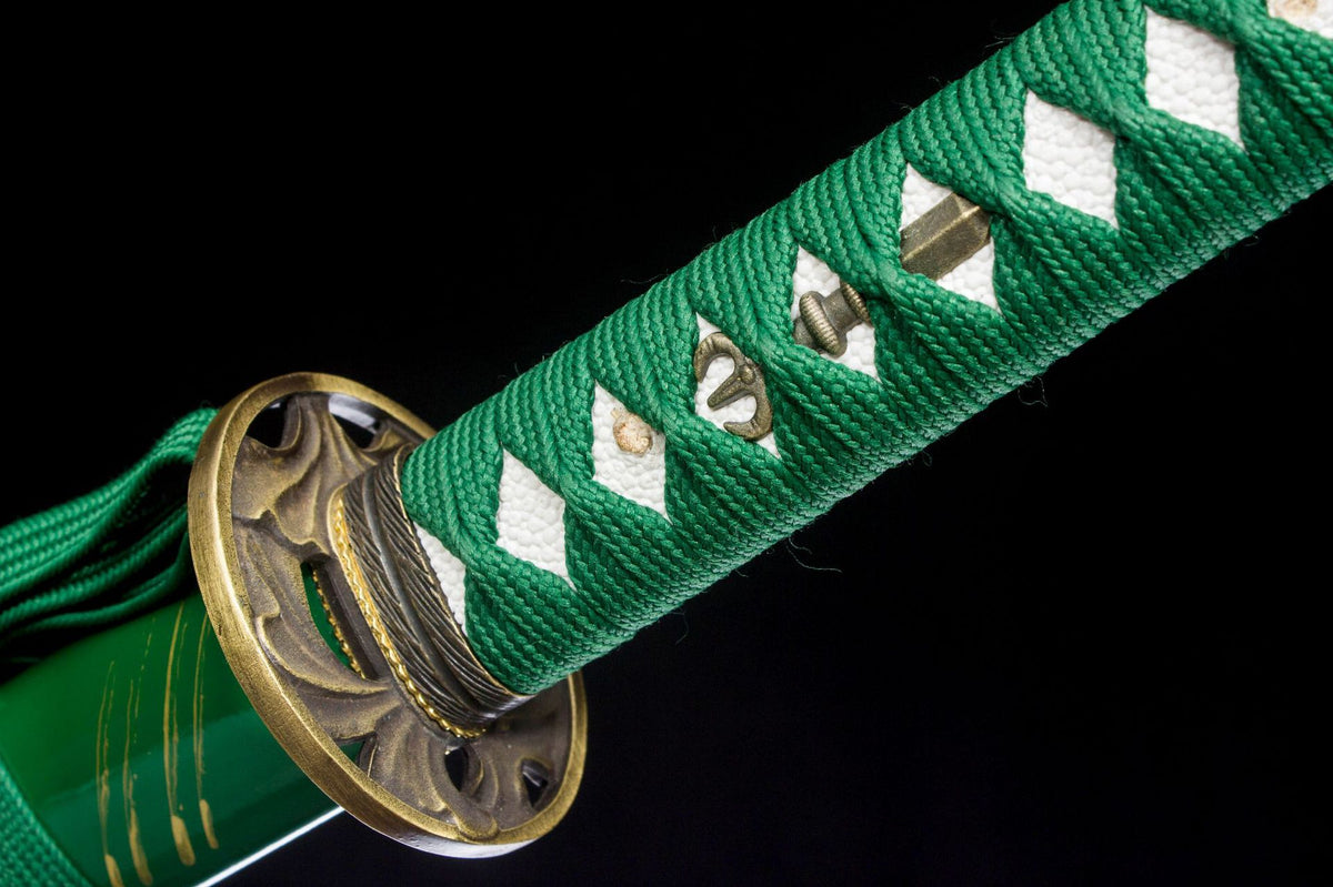 Detail view of the Jade Striation Katana, showing the green handle wrap and pale blade