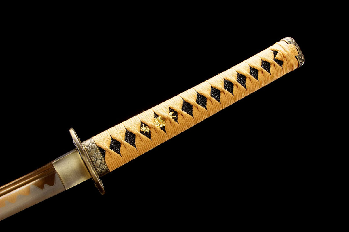The Golden Pearl Katana with the warm-toned mounting details