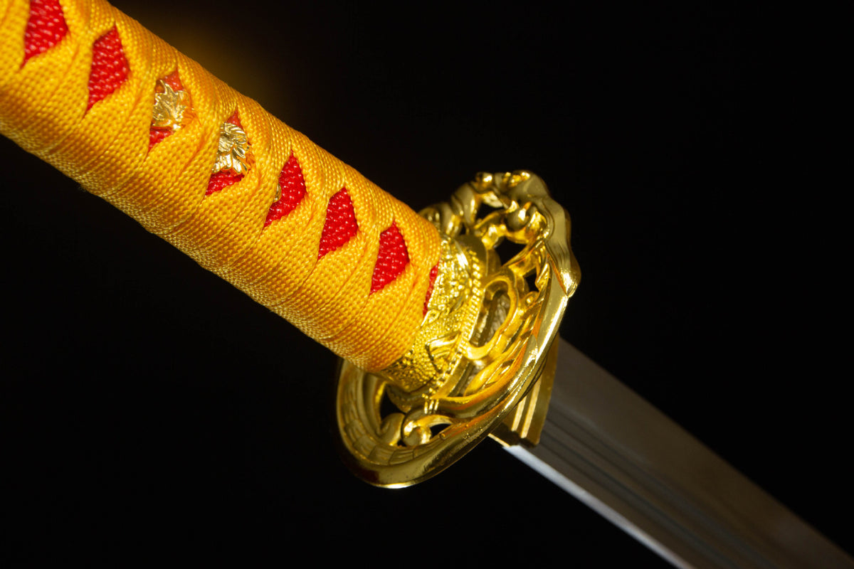 Close-up detail of the Twin Rivers Katana, including the gold dragon-patterned saya