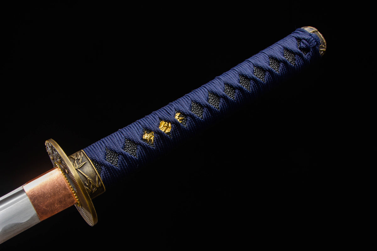 Midnight Studwork Katana showing the studded handle wrap and gold-toned fittings