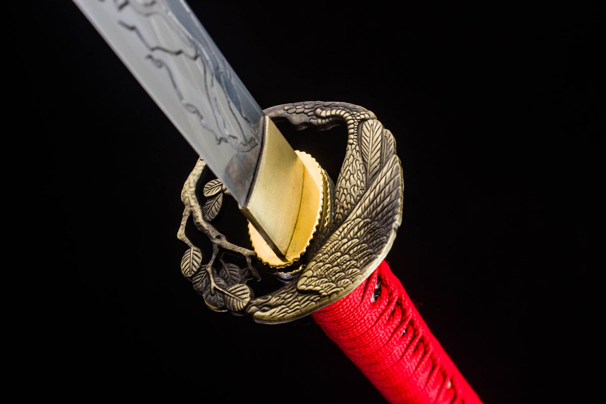 Detail view of the Crimson Crackle Katana, showing the polished blade and red handle wrap