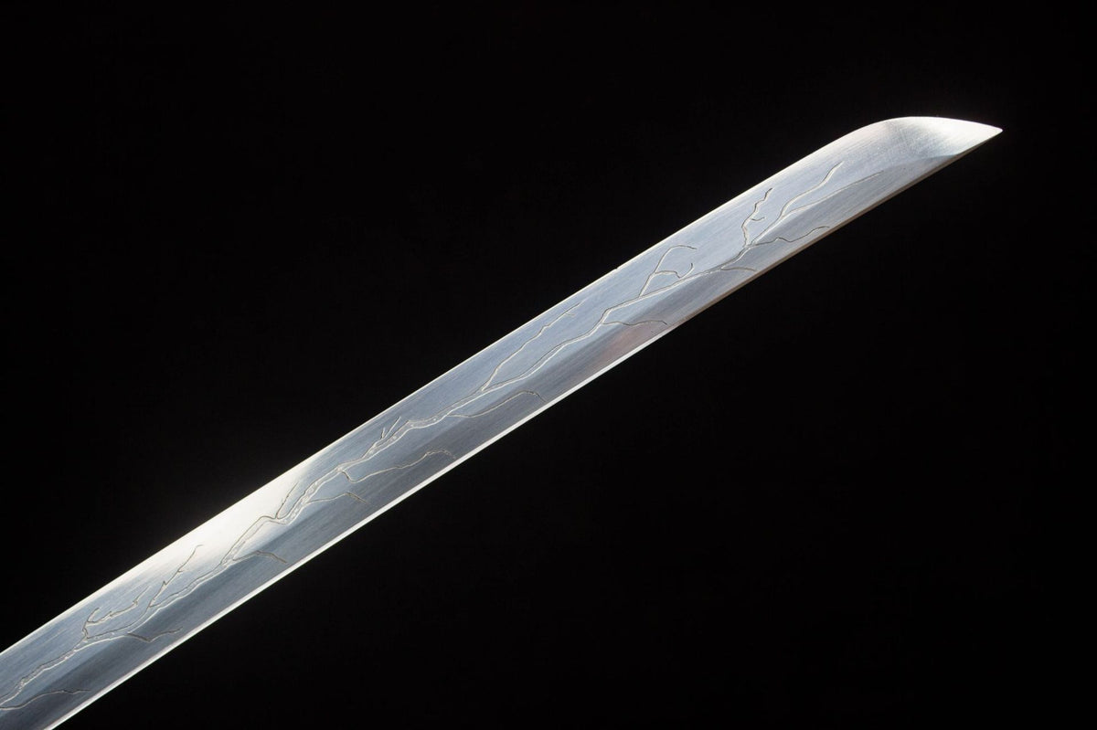 The Moonlit Dragon Katana, showing the black-and-white dragon artwork
