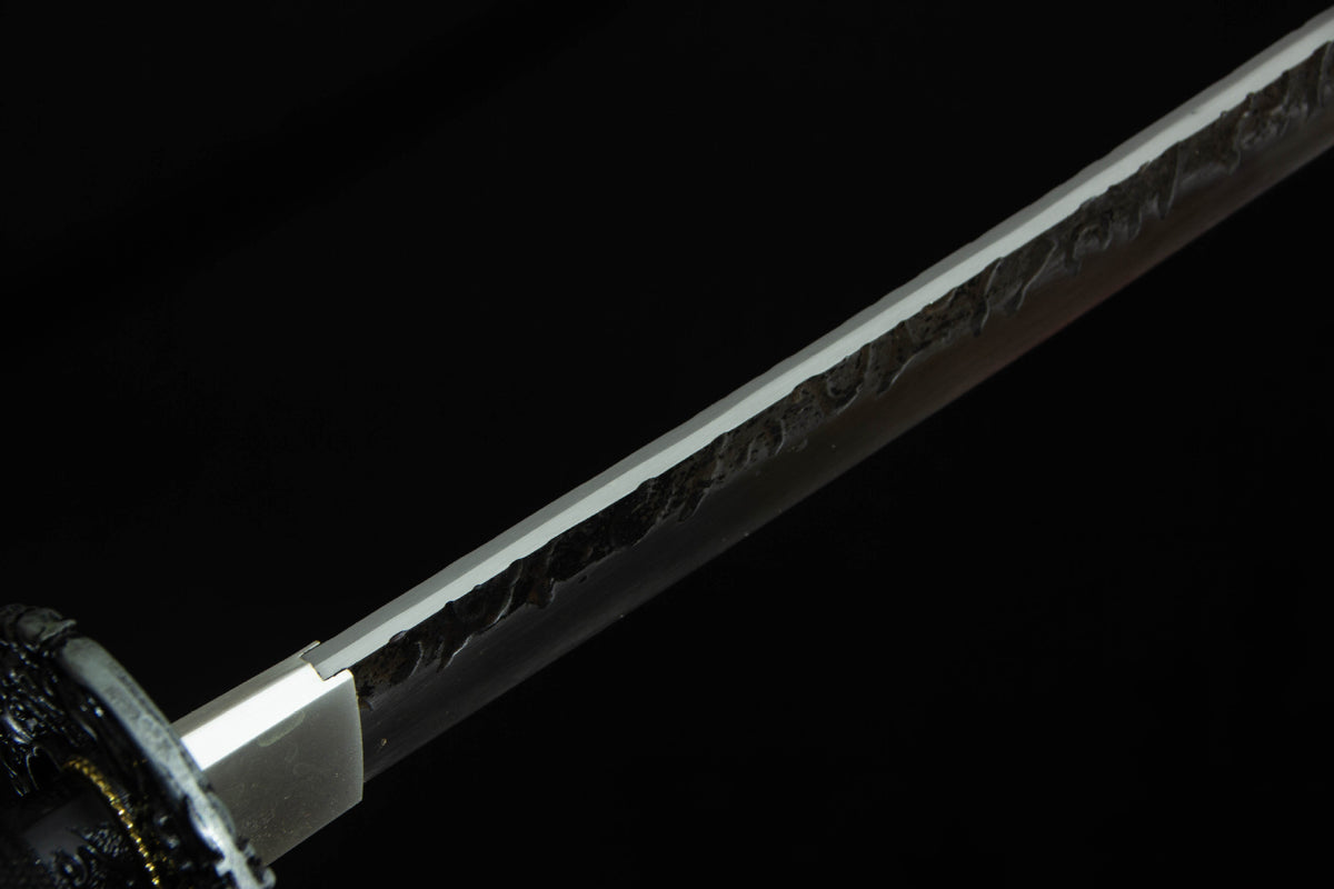 The Autumn Mist Katana, showing the red maple accents