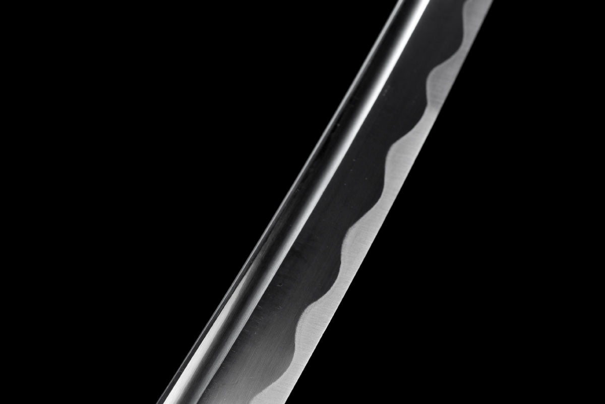 Close-up of Kuro Katana polished blade showing its visible wave-like blade line