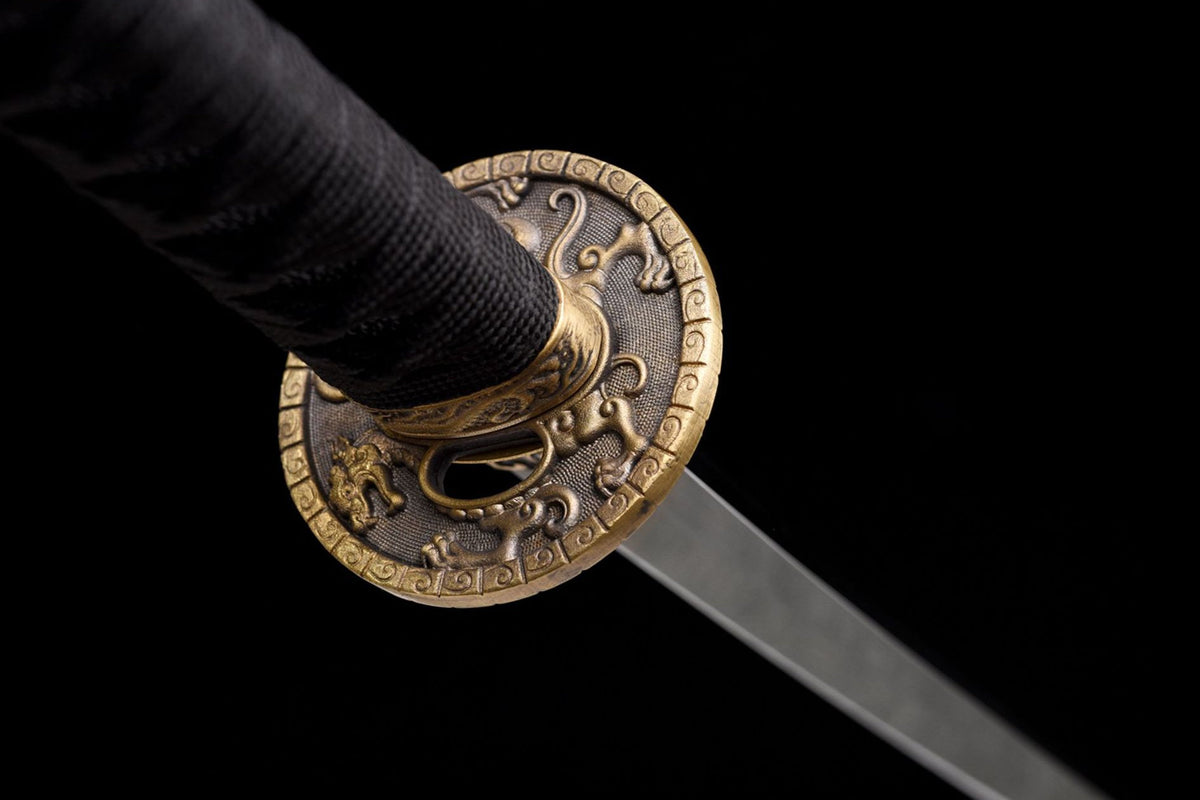 The Twin Dragons Katana with the central pearl motif on the saya
