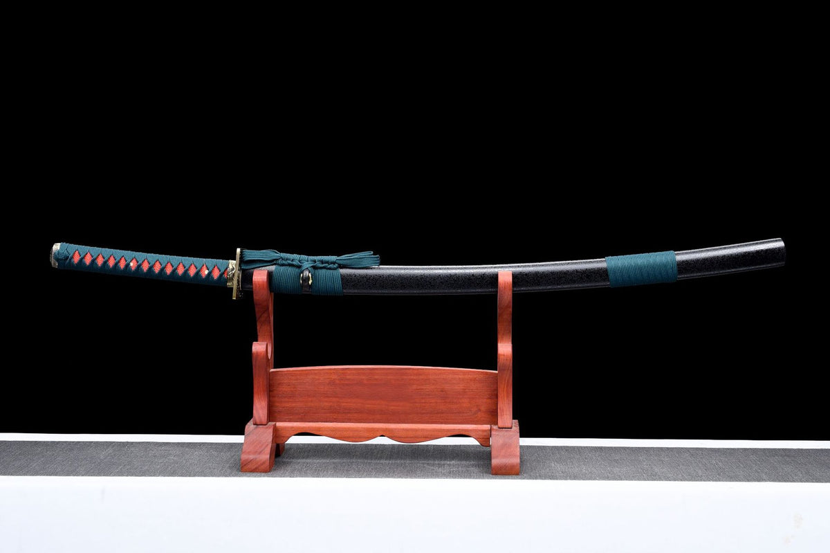 One Piece Kyoshiro Katana sheathed with teal handle wrap, black speckled saya, and dark blue sageo