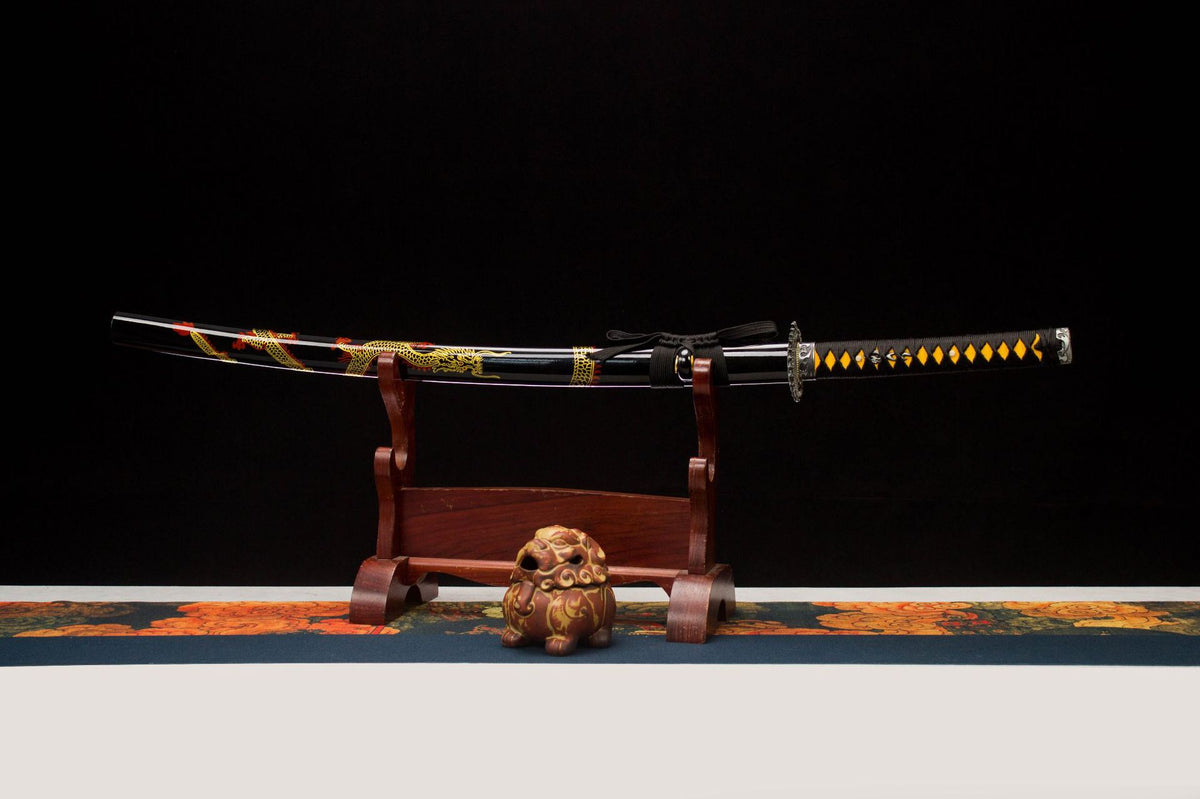 Night Coil Katana with a silver blade, black saya, and gold coil motif