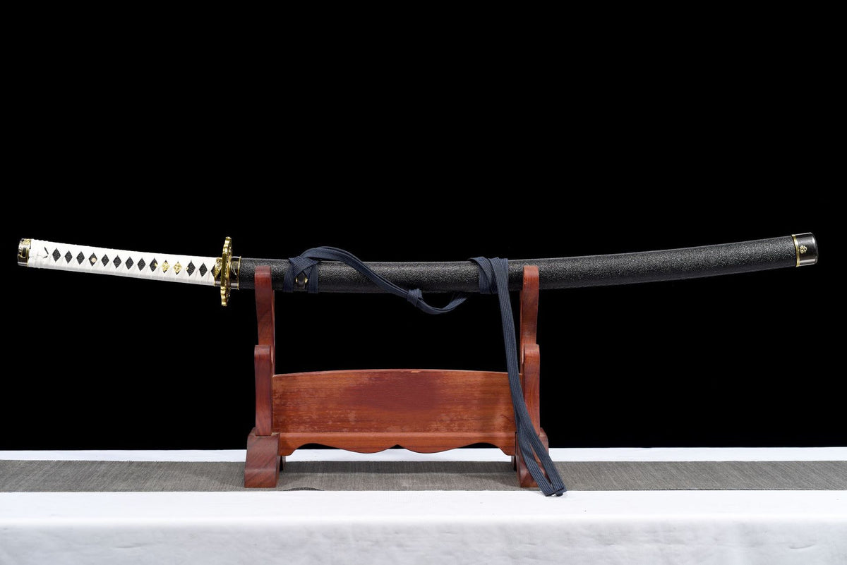 Close-up detail of the Devil May Cry Yamato Katana, including the black PU-covered saya and dark blue cord