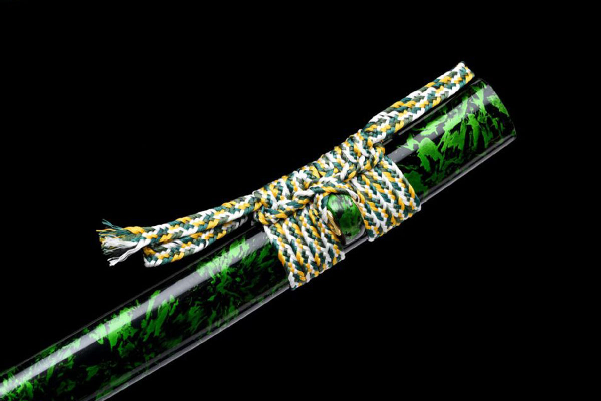 Thick green white and gold sageo tied around patterned saya