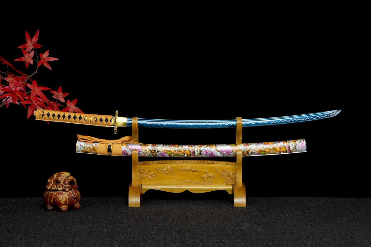 Indigo Lightning Katana with a blue-toned blade, gold handle wrap, and colorful patterned saya