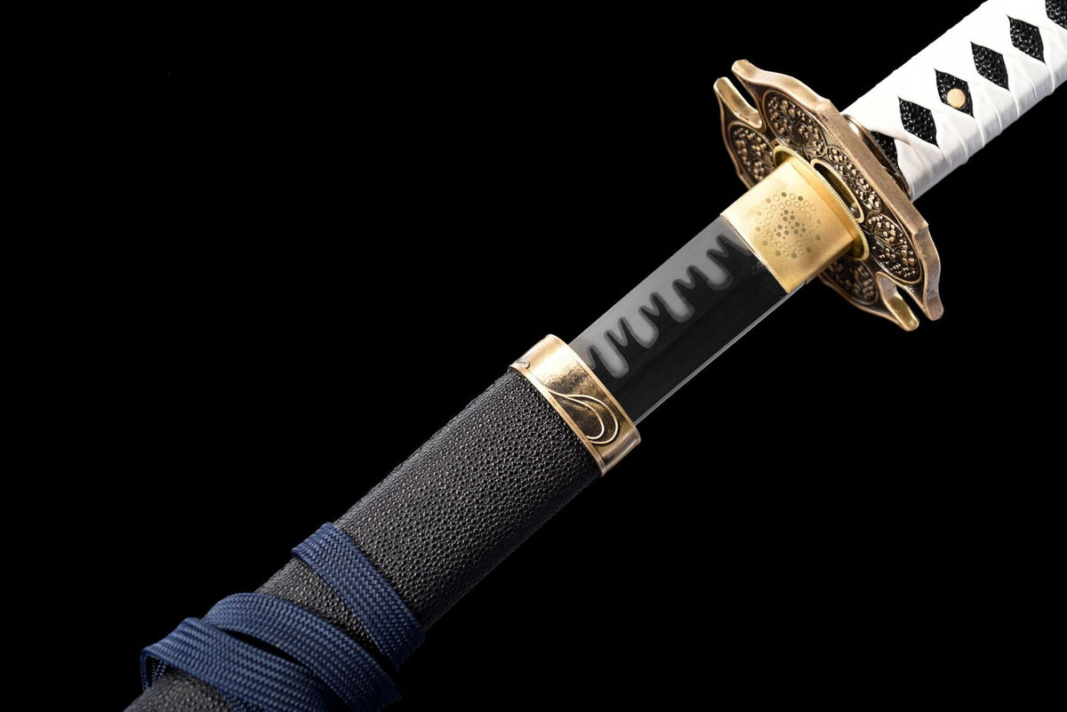Close-up of the Extended Yamato Katana’s white handle, gold fittings, and black saya