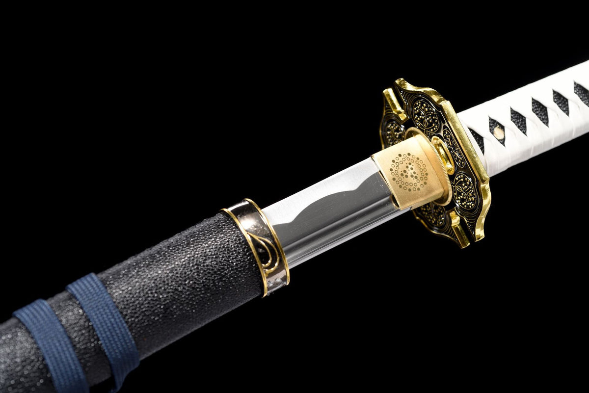 The Devil May Cry Yamato Katana, showing the white handle wrap and gold-accented fittings