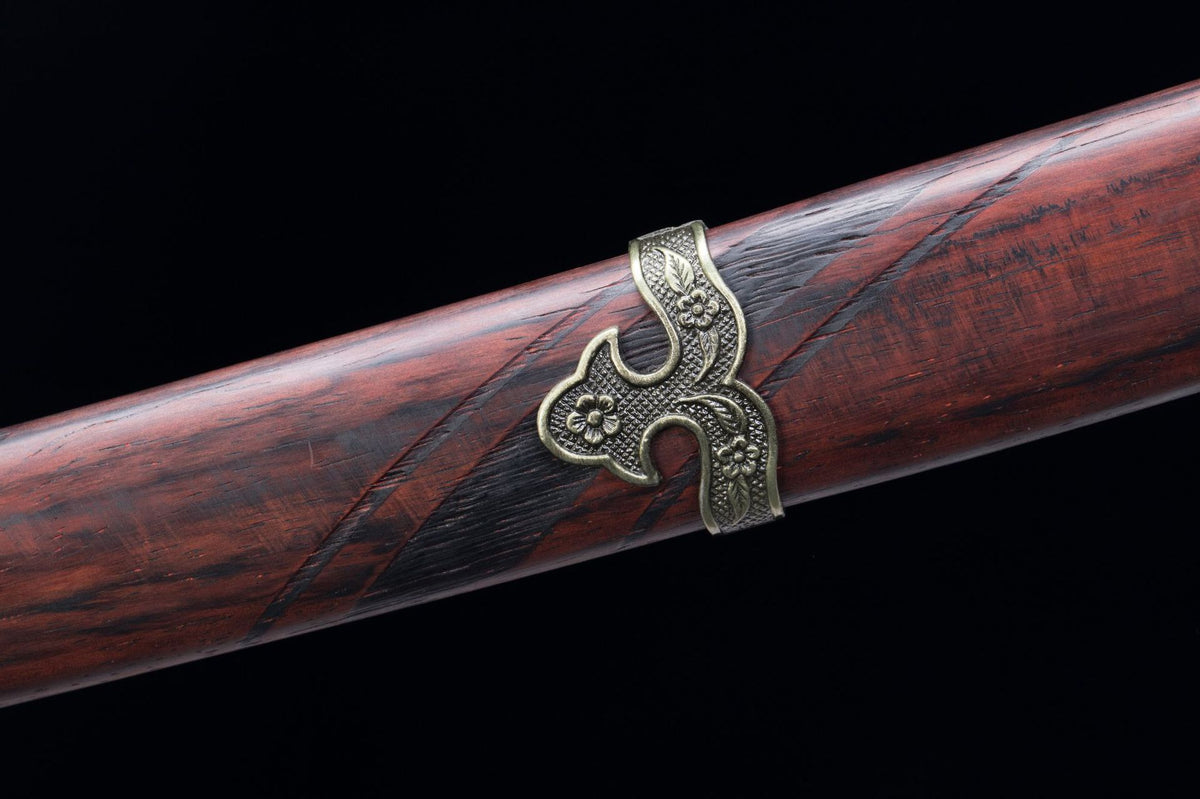 Detail view of the Sekiro: Raijin Katana, showing the red handle wrap and decorative fittings