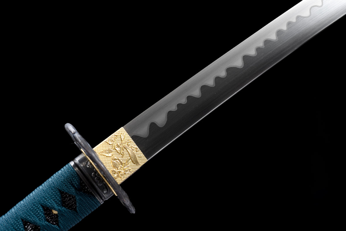 Close-up of the Garden at Dusk Katana’s flowing blade line, gold collar, and blue handle