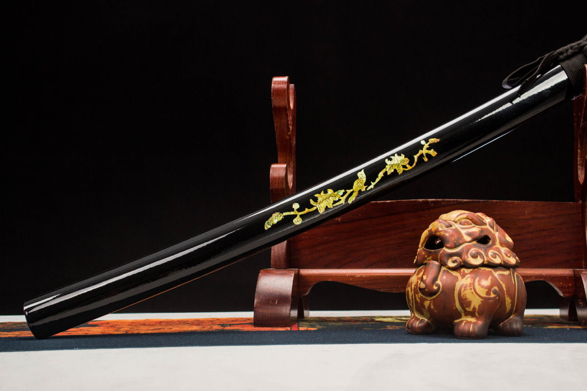 The Gilded Dragon Katana, showing the gold dragon motif on the lacquer