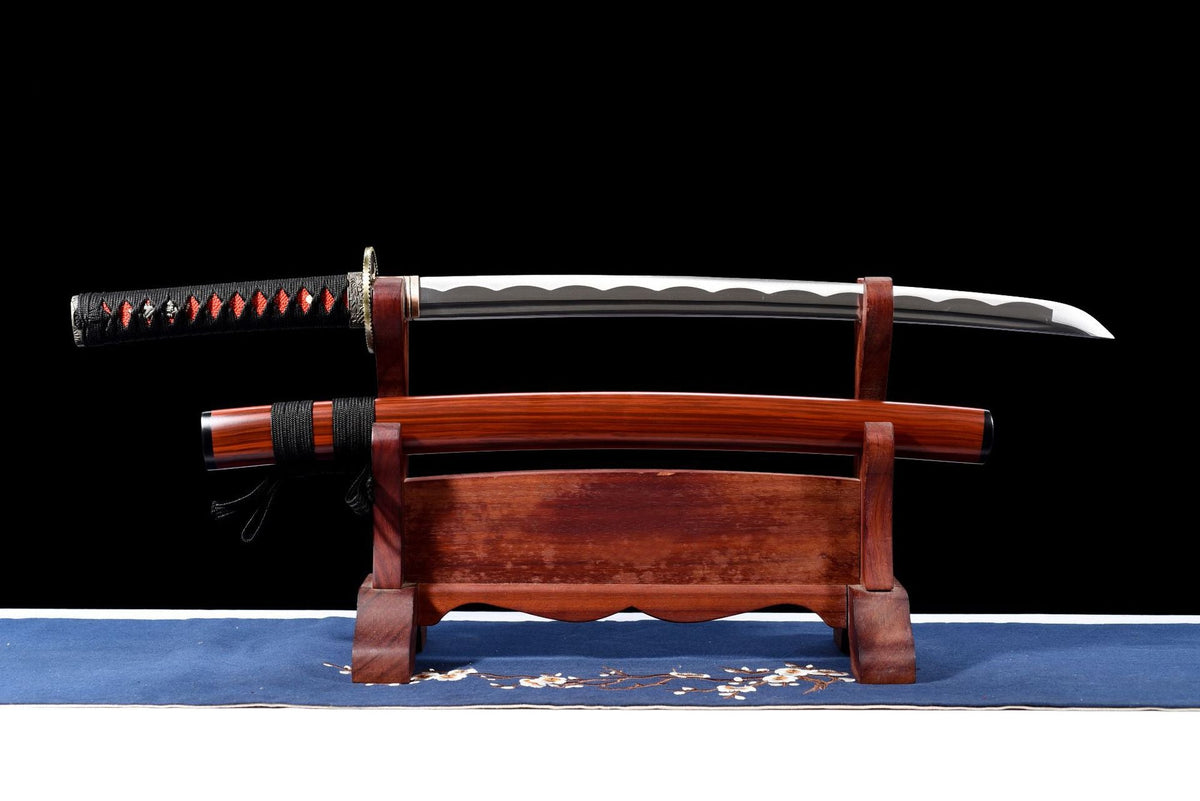 Take Wakizashi, full view with bright blade, black-and-red handle, and reddish wood-grain saya