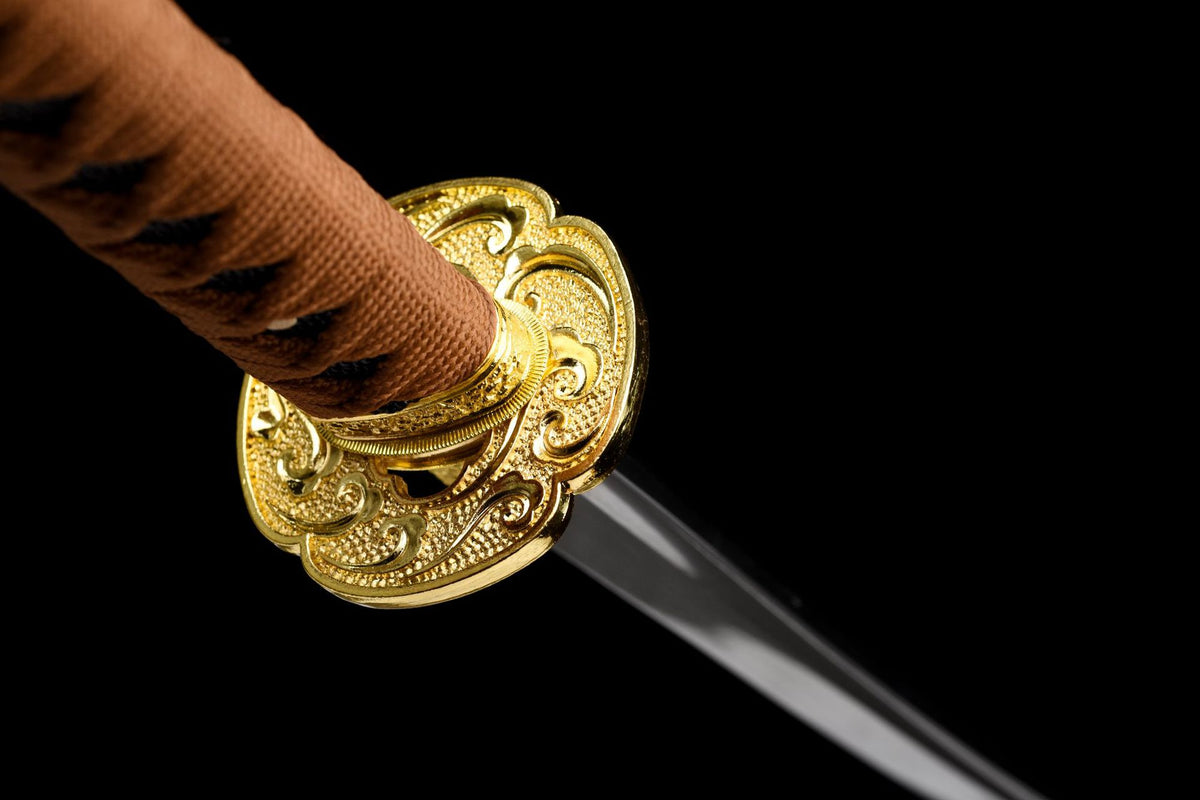 Six-lobed scrollwork tsuba and brown tsuka wrap on the Amber Lacquer Katana