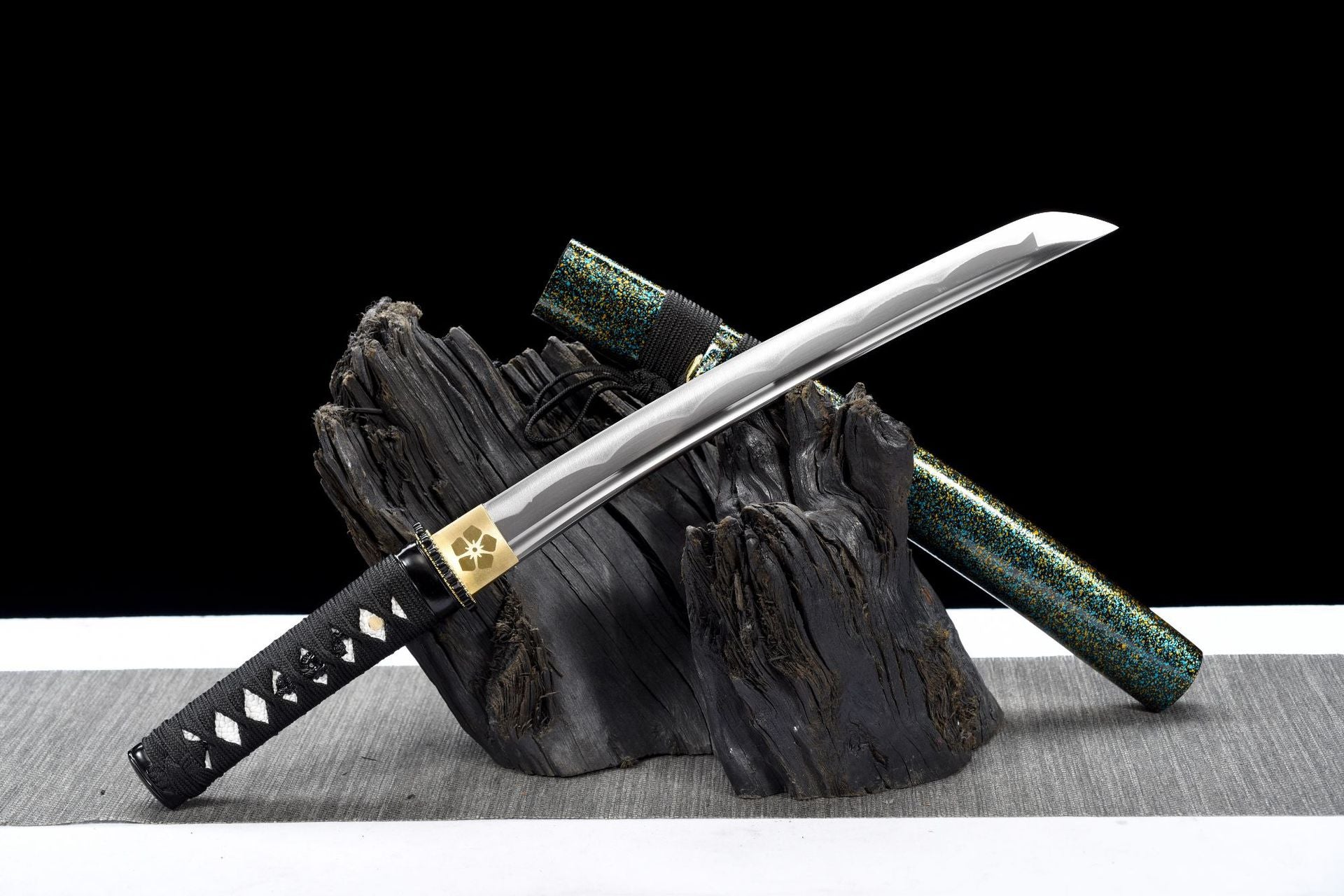 Aogane Spark Wakizashi displayed with its blue-gold lacquered saya