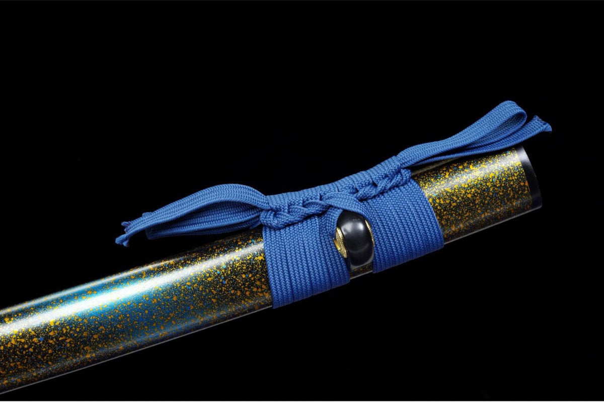 Speckled blue-and-gold lacquered wood saya with tied blue sageo