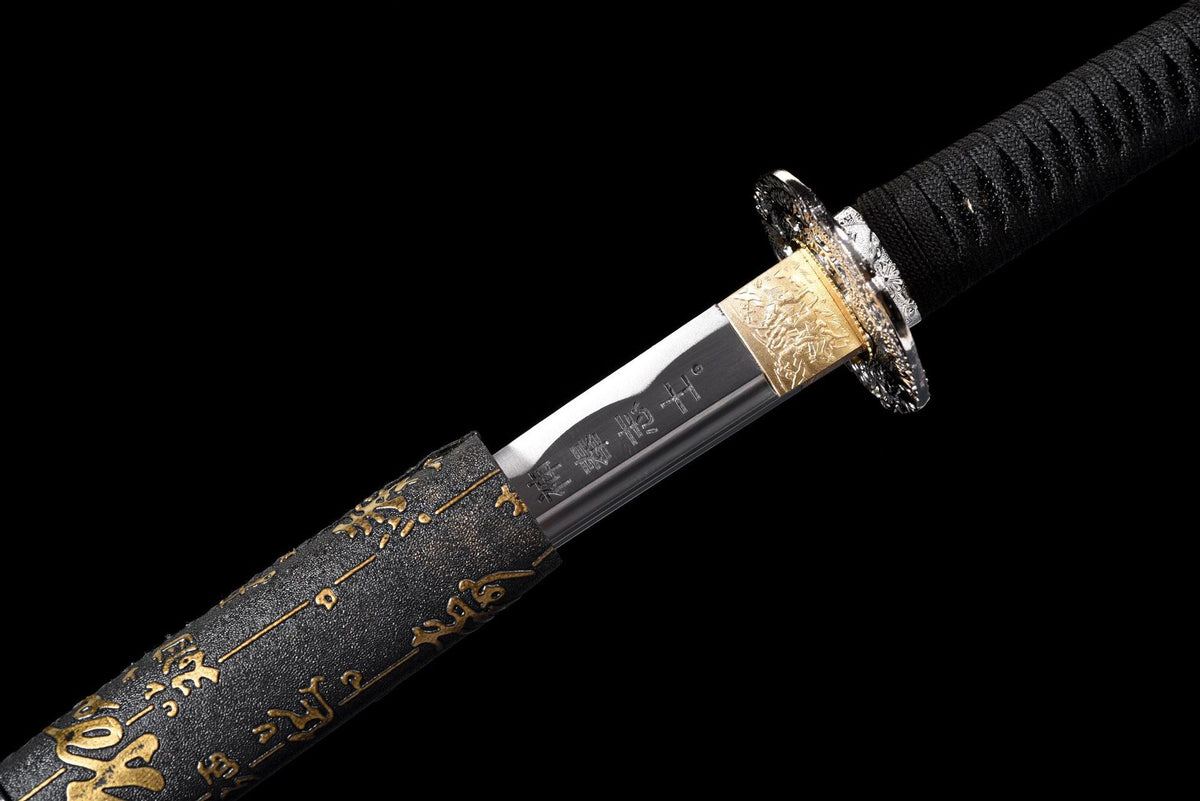 Gold-toned engraved blade collar and polished blade