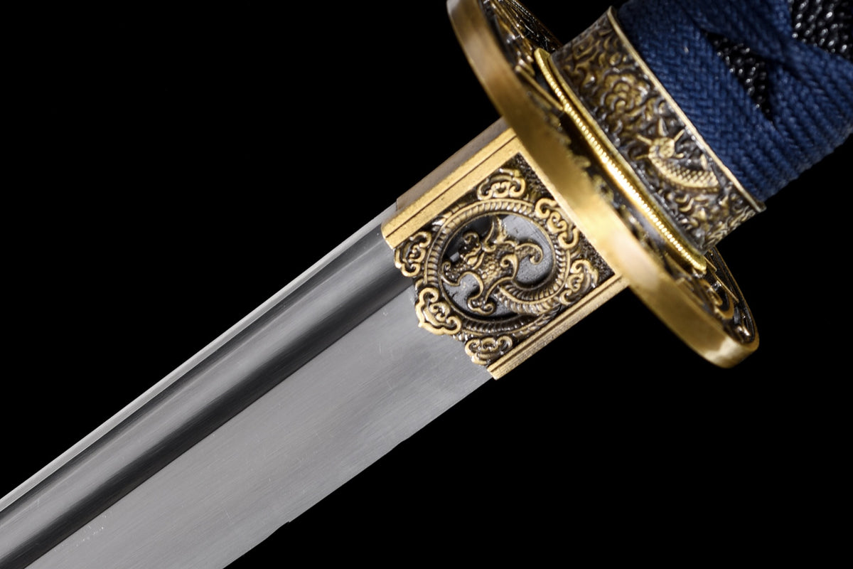 Gold-toned blade collar with dragon relief and polished blade