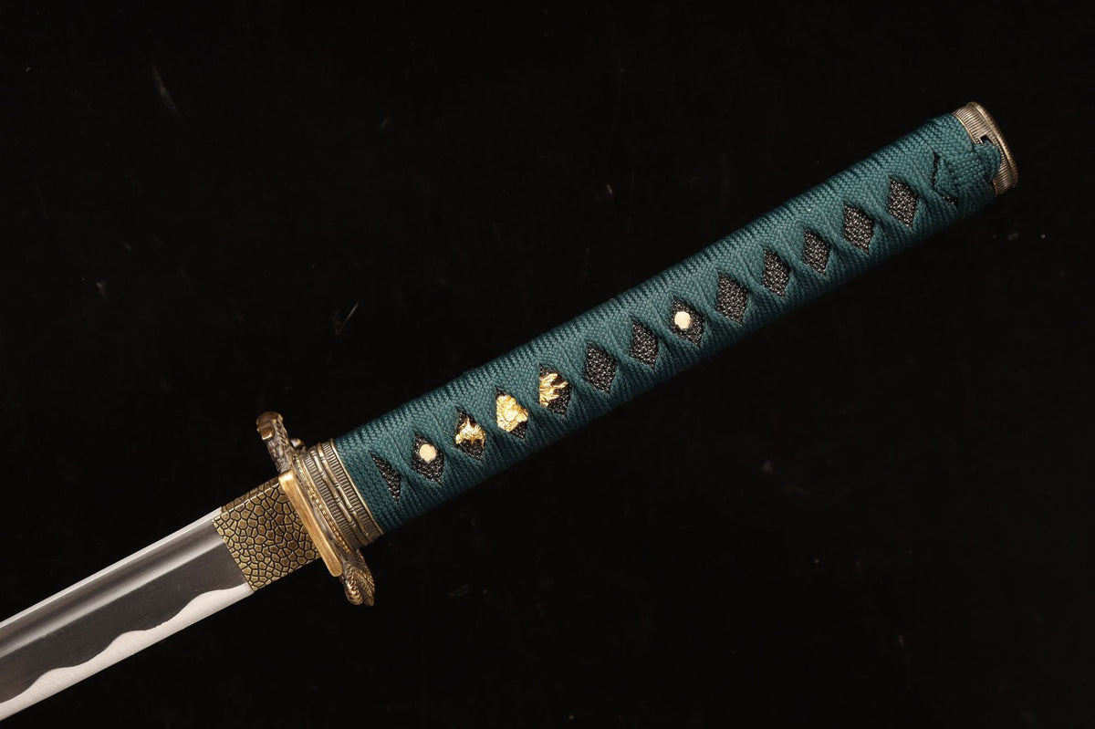 Deep teal tsuka-ito over black panels with gold-tone menuki