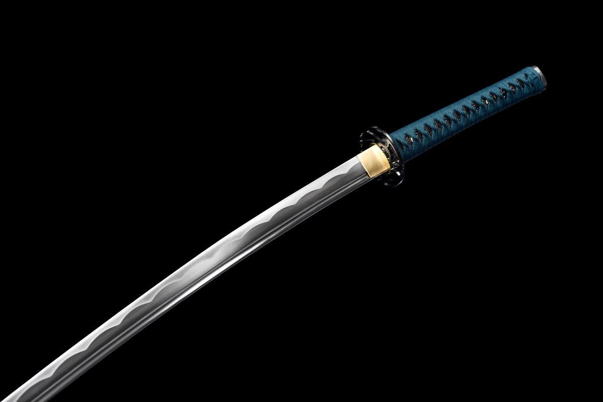 1045 steel blade with long bo-hi and decorative hamon-style pattern