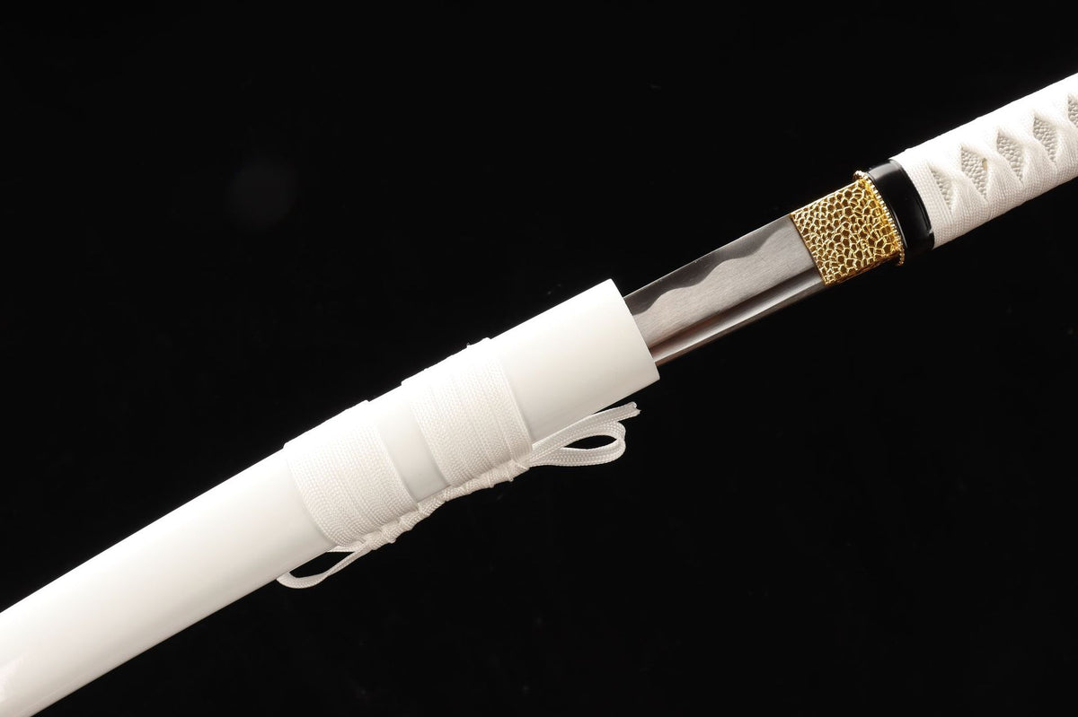 Guardless aikuchi-style mounting with gold-toned alloy collar