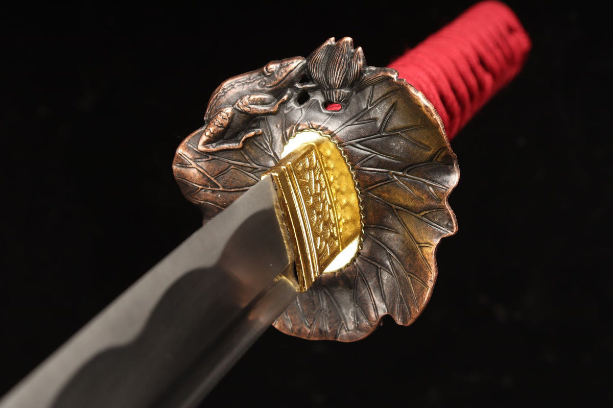 Frog and lotus-leaf tsuba on the Lotus Return Katana
