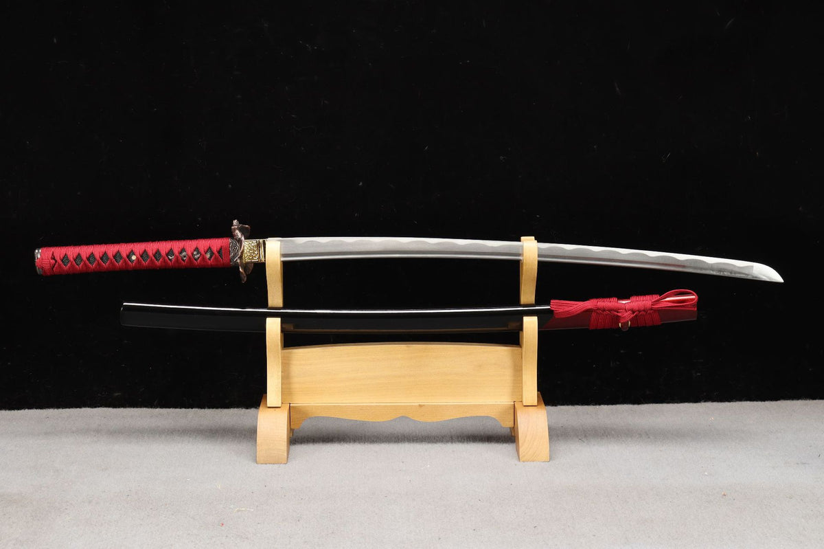 Lotus Return Katana unsheathed beside its red-and-black lacquered saya