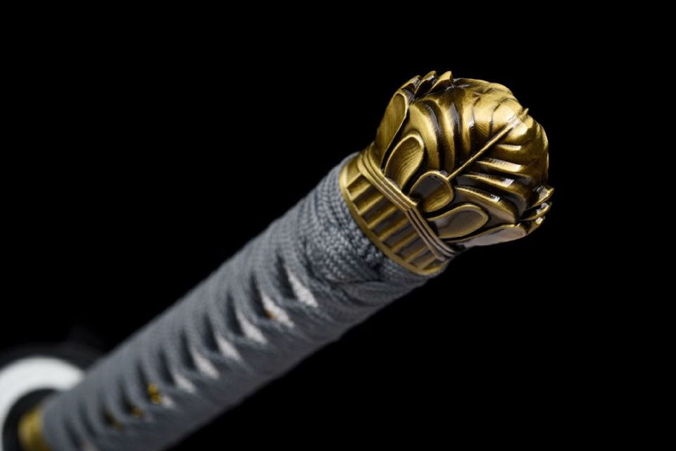 Antique-gold-tone petal-form kashira on the gray wrapped tsuka