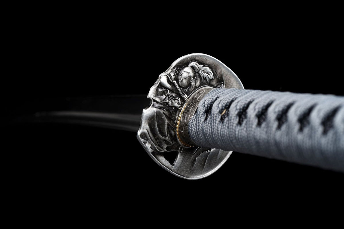 Warrior relief tsuba and gray-wrapped tsuka on the Silent Warrior Katana