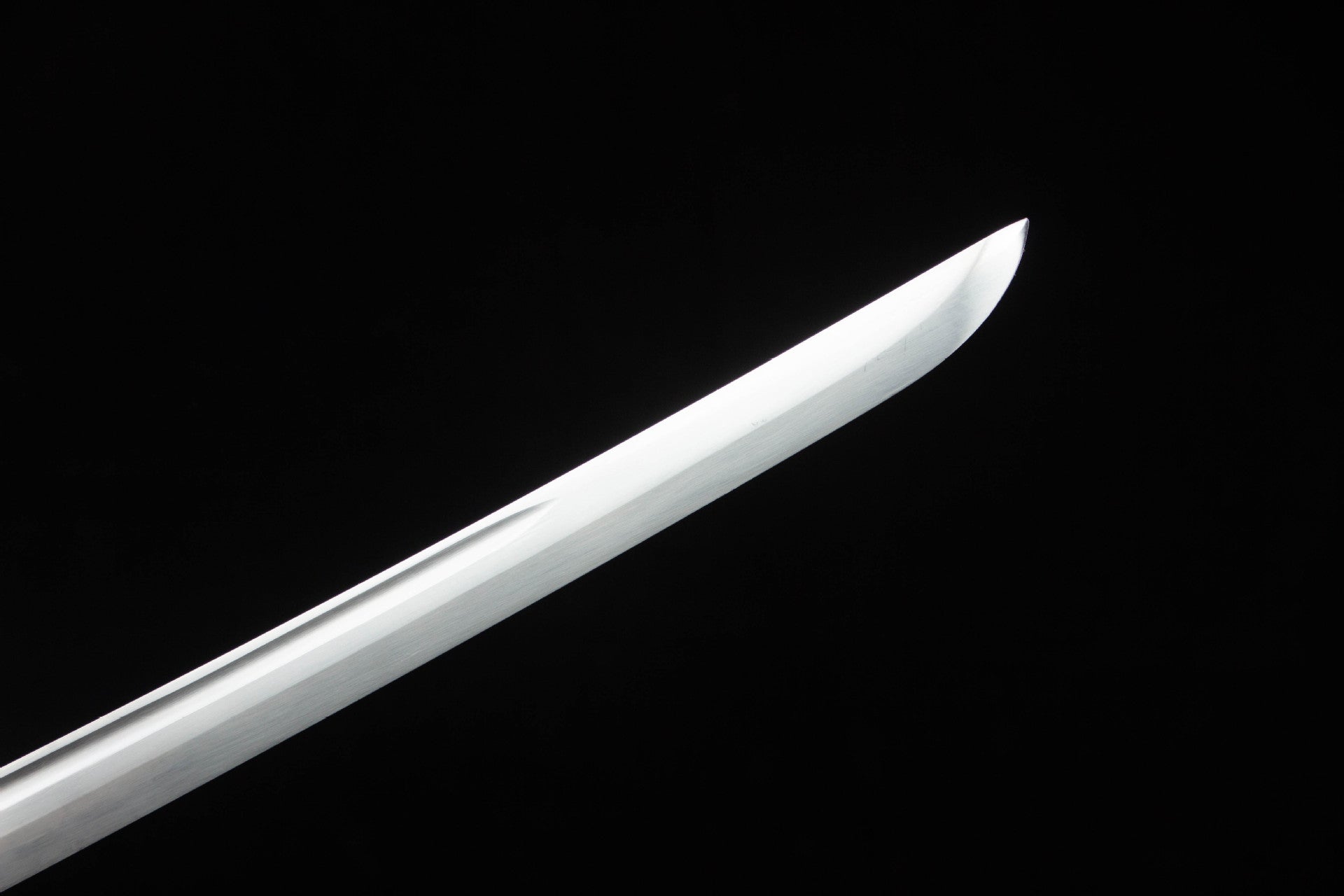 Curved kissaki tip of the sharpened Silver Dragon Katana