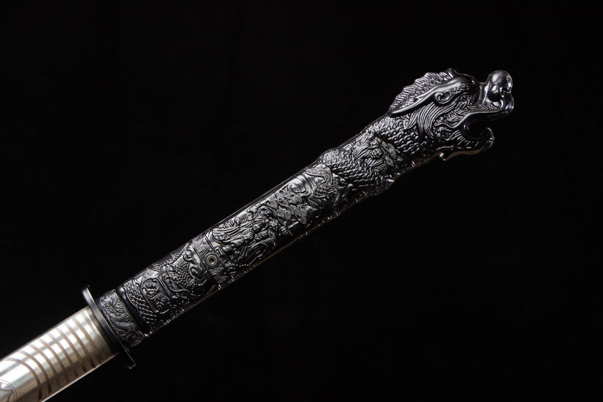 Black sculpted dragon handle on the Silver Dragon Katana