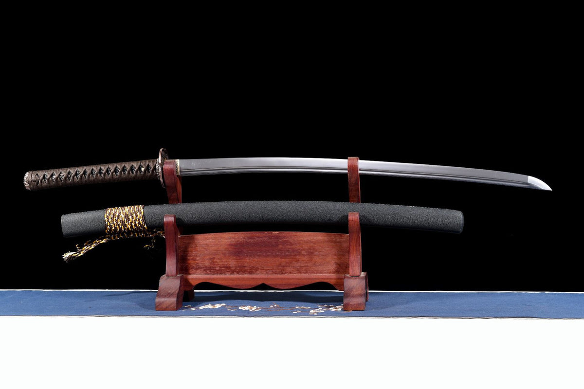 Unsheathed Six Masks Katana displayed with its black saya