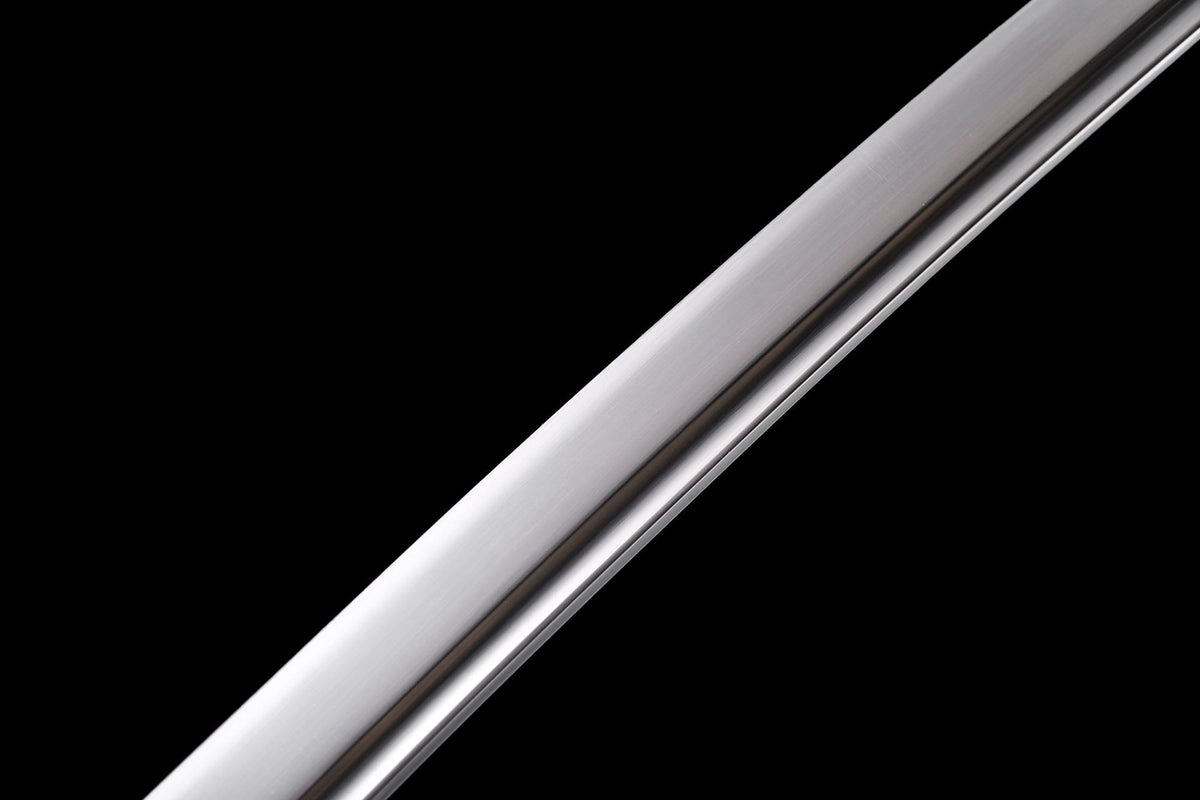 Long bo-hi running along the polished katana blade