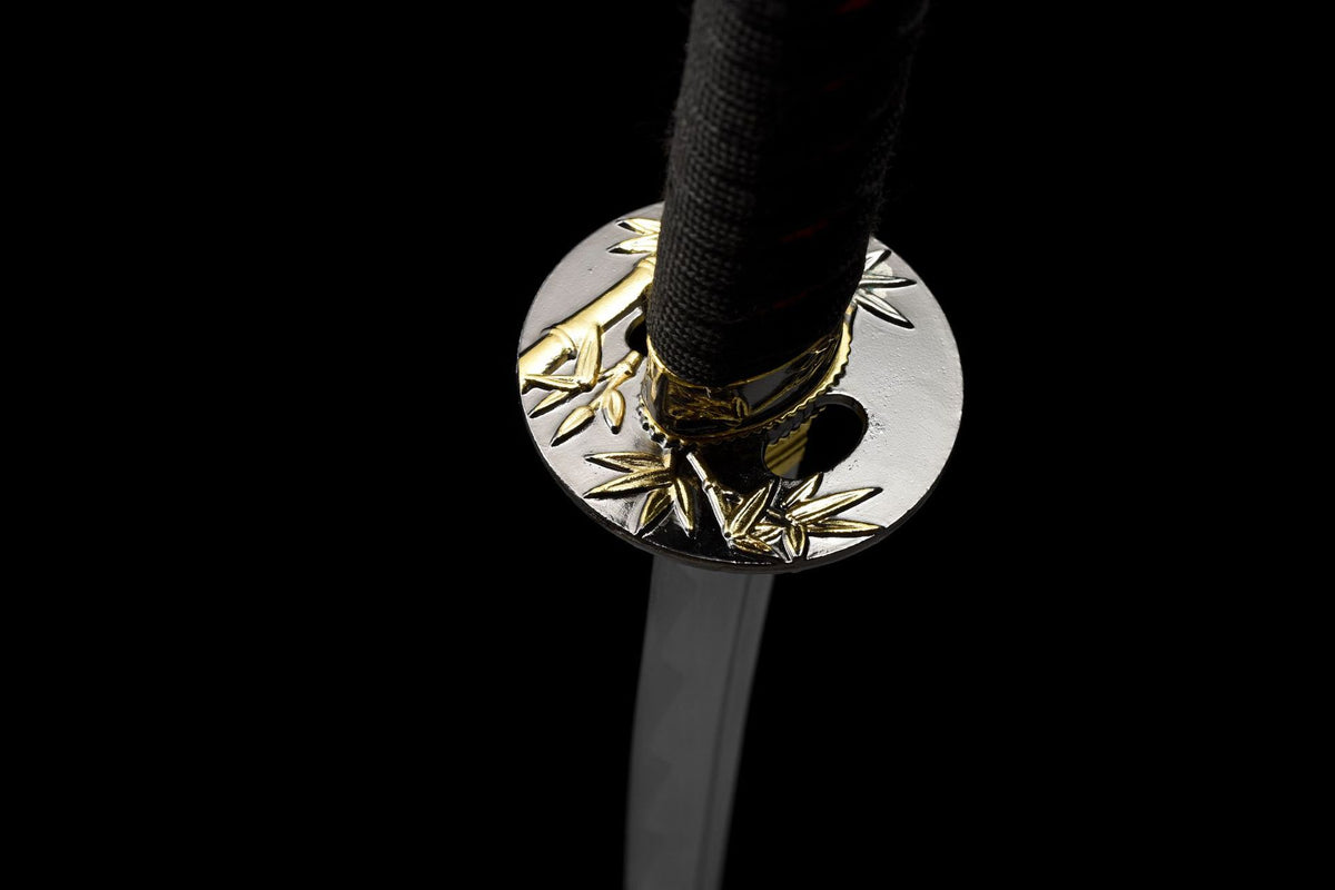 Detail of the dark and gold-toned bamboo-leaf guard