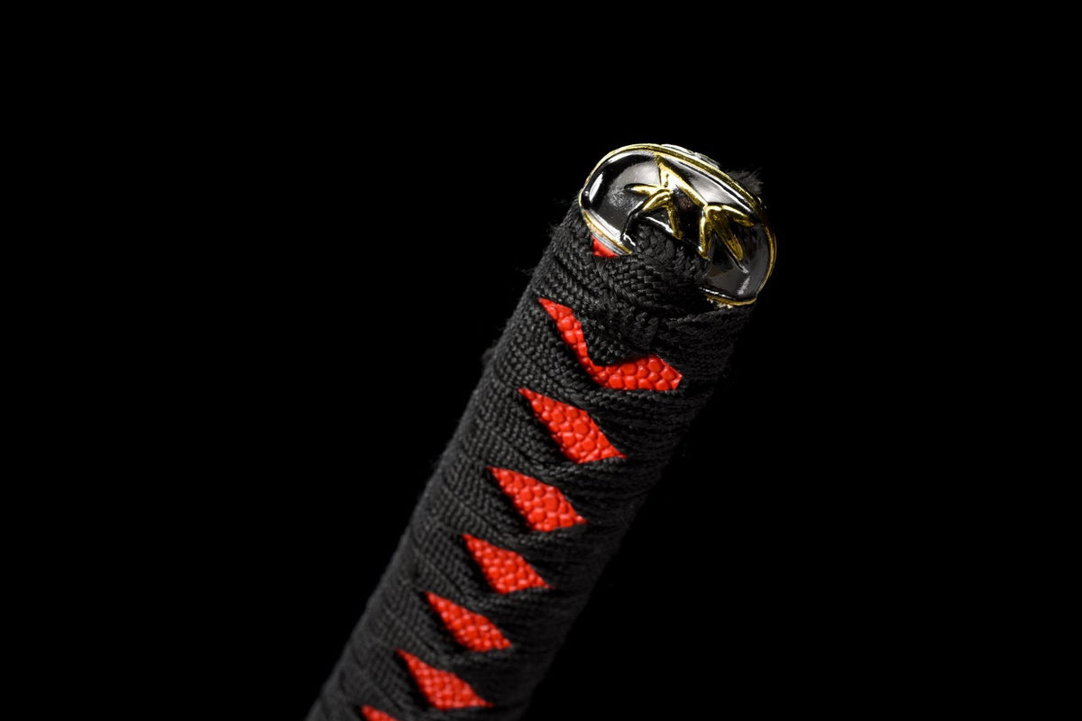 Blade tip showing the polished finish, fuller, and decorative line