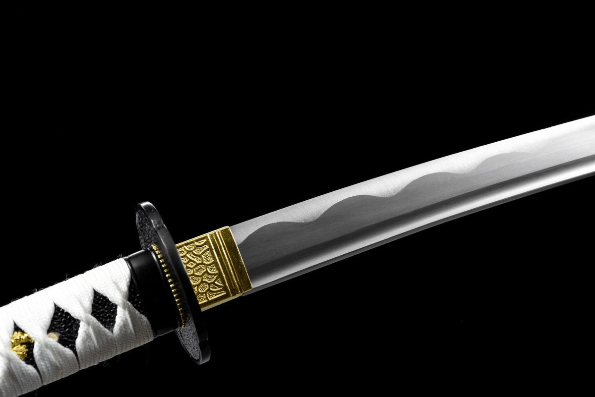 Polished high-carbon steel blade with decorative wave line