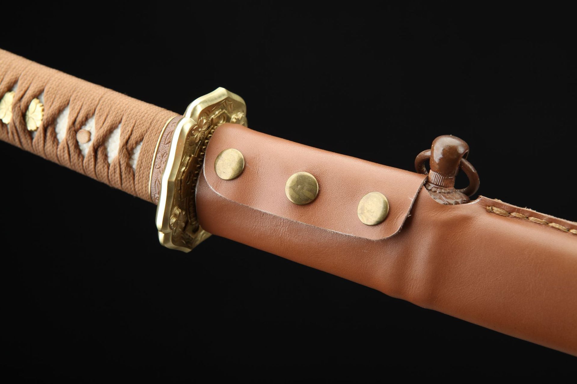 Close-up of S426 katana khaki leather scabbard.