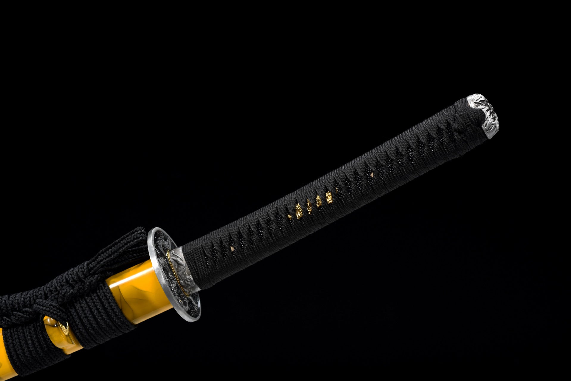 A full view of the black hand-wrapped tsuka handle, highlighting the intricate and secure wrapping design.