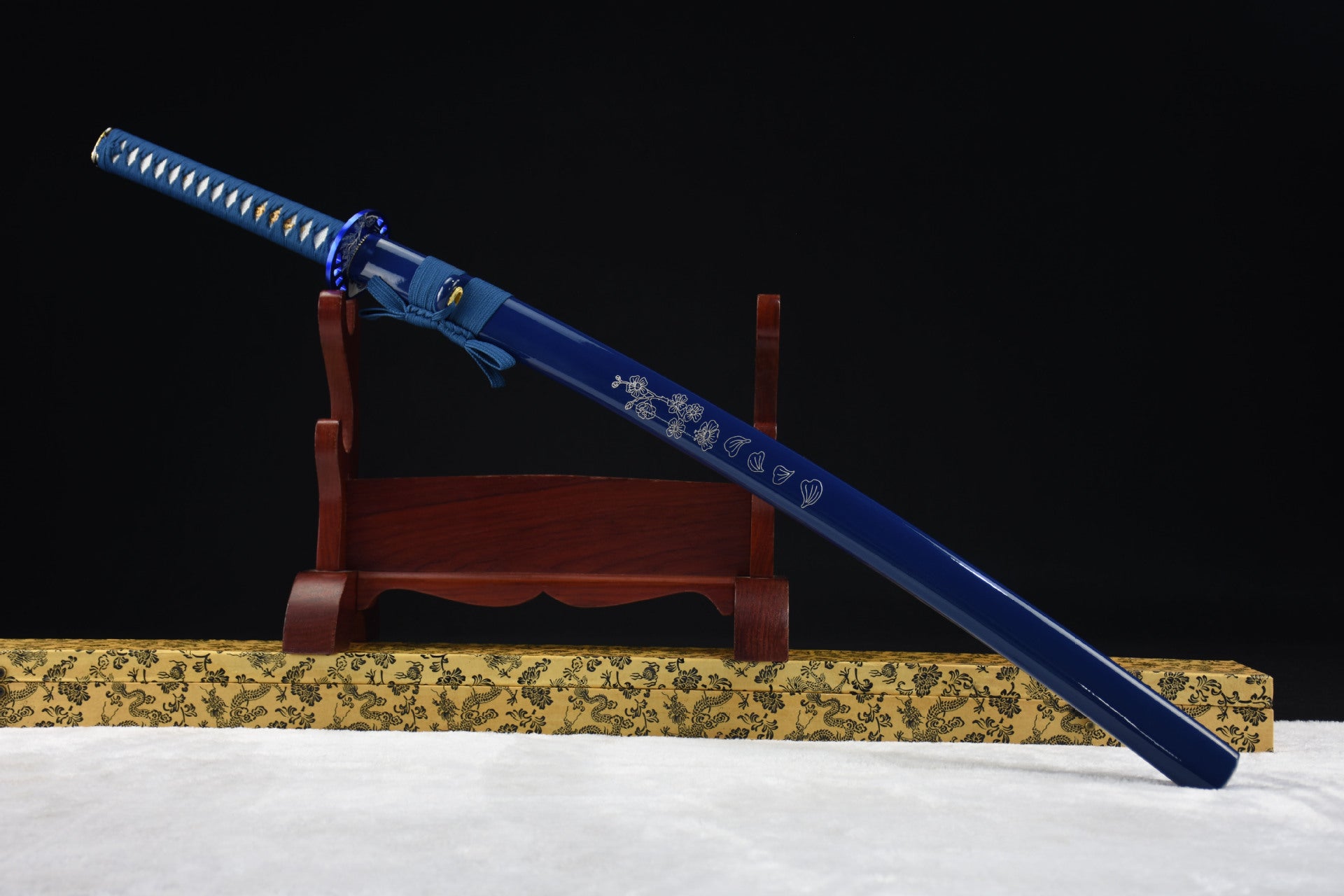 A blue Samurai sword featuring a Sakura pattern.