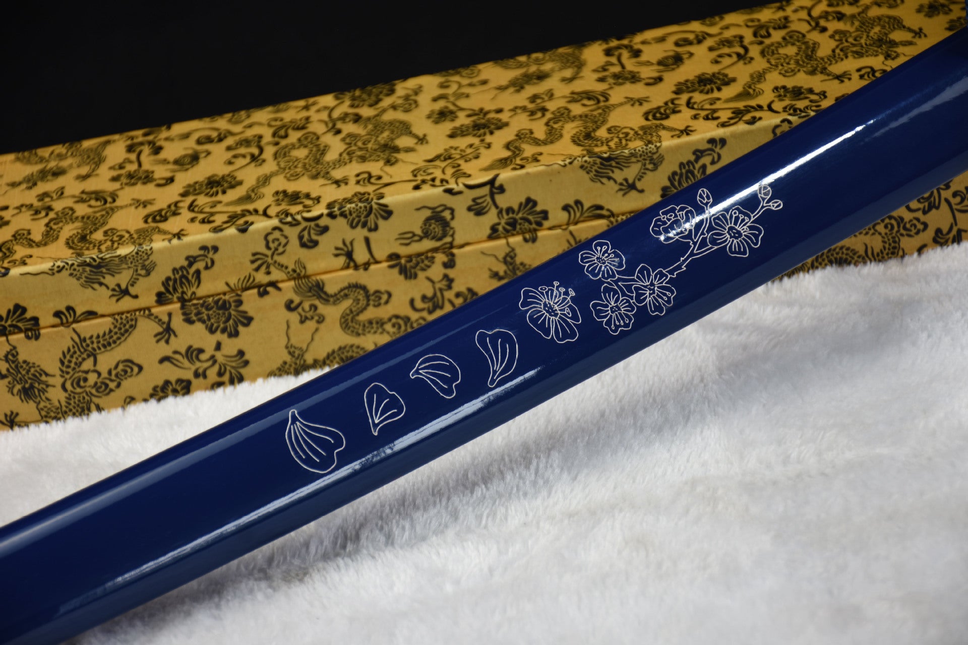 A blue Saya featuring a Sakura pattern.