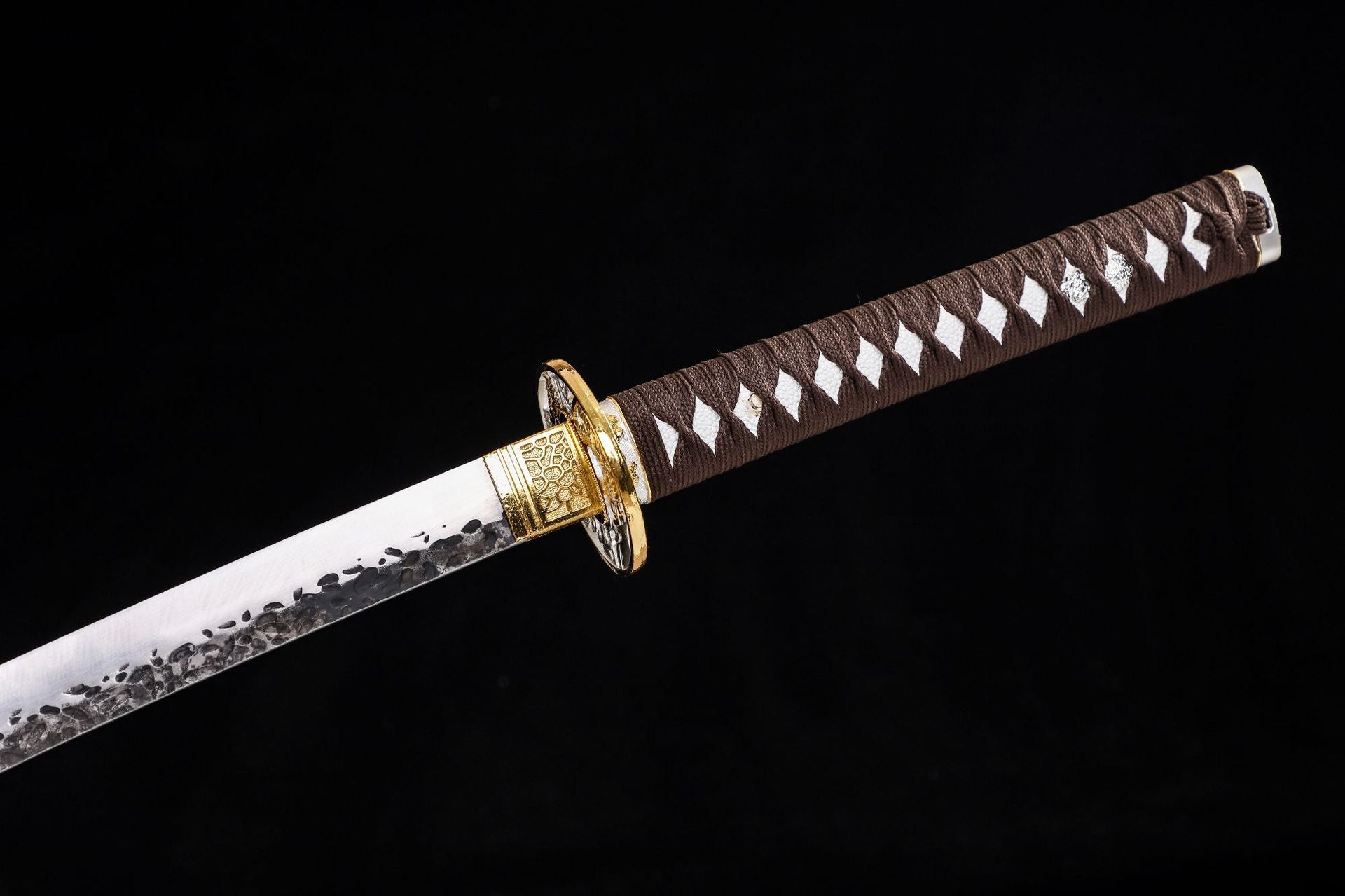 A full view of the brown katana handle with wrapped brown tsuka-ito, highlighting its elegant and functional design.
